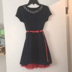 Young girls blue and red shimmery dress.